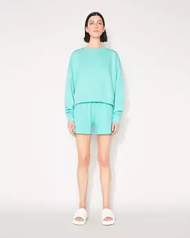 ESSENTIAL CROP SWEATSHIRT - ARUBA BLUE